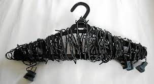 Store Christmas Lights Wrapped Around A Hanger So They Never Get Tangled Diy Christmas Light Storage Diy Christmas Lights Christmas Light Storage
