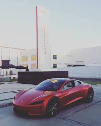 A Red Tesla Roadster Has Been Spotted Outside The Automaker S Design Studio In California For Several Days Now Tesla Roadster Roadsters Tesla