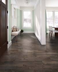 Homes Always Look Better With Contrast We Love This Mint Green Wall With The Dark Pergo Max Premier Smoked Chestnut Floor Flooring Mint Green Walls Home