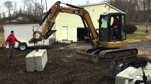 Ultimate Mini Excavator Challenge Kubota U55 Vs Cat 305 Strength Test