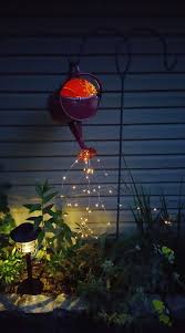 Watering Can With Lights Garden Lighting Diy Diy Garden Front Yard