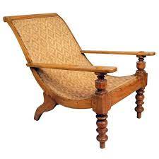 South Indian Caned Satinwood Planter S Chair 1stdibs Com Vintage Lounge Chair Indian Furniture Chair