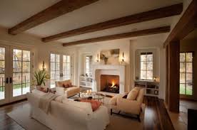 Symmetry is one of the keys traits of traditional decor and makes a space super. Decor Interior Cu Grinzi De Lemn Aparente Traditional Design Living Room Neutral Living Room Design Country Living Room