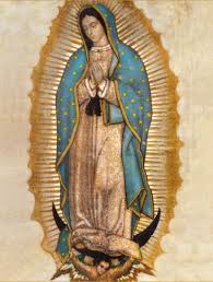 She is standing on a crescent moon supported by an angel underneath. Mexico City S Shrine To Our Lady Of Guadalupe Spiritual Travels
