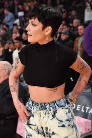 The seed they planted is growing! The Meaning Behind Halsey S 30 Tattoos Popsugar Beauty