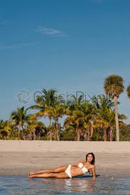 With the holiday weekend just around the corner, we look for last minute ways to shape up. Sensual Woman Full Body Portrait Wearing Swimsuit Relaxing On Th Stock Photo Crushpixel
