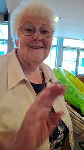 Can someone remove letter from hand in photo?