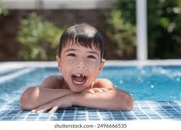 2+ Thousand Boy Edge Swimming Pool Royalty-Free Images, Stock Photos &  Pictures