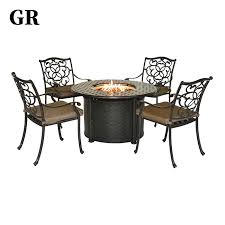 They offer warmth and ambiance to any dining experience. Factory Supply Luxury Cast Aluminum Metal Outdoor Furniture Dining Round Table Fire Pit Set Buy Cast Aluminum Outdoor Furniture Outdoor Table Set Metal Fire Pit Product On Alibaba Com