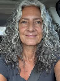 Ways to Sport Wavy Hair with Bangs in a Stunning Way