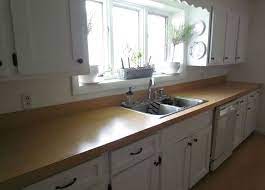 Wood countertops attract homeowners with the face grain is best for making a dining island or bar top and will be best protected with full sealing. How To Make Laminate Countertops Look Like Wood For Less Than 100 00 Sheep Shop