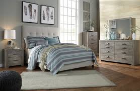 For full size bed frames, it's 54 inches and twin size frame headboards are around 39 inches. Contemporary Beige Upholstered Panel Bedroom Set From Ashley Coleman Furniture
