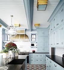 light blue cabinets with black counter