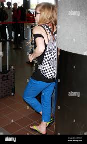 Pop rocker Avril Lavigne gets dropped off at LAX by boyfriend Brody Jenner  to catch a flight out of town. Lavigne looked very cool as she made her way  through the airport,