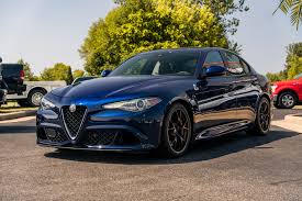 Image result for Blue Montecarlo 2005 Alfa-Romeo