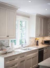 It also incorporates the ceiling's crown molding for continuity. Painted Furniture Ideas Kitchen Cabinets With Crown Molding Design Cheap Ikea Hanging Painted Furniture Ideas
