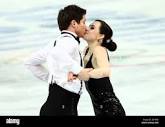 Sochi, Russia. 8th February 2014. Tessa Virtue kisses Scott Moir ...