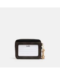 A slim design, it has four card slots and an expandable zip compartment for coins, cash or receipts. Coach Zip Card Case In Signature Canvas In Im Brown Black Black Lyst