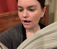 A very happy birthday to ONRAC co-founderer and co-discoverer Carrie Poppy!  Seen here sinking her teeth into a book.