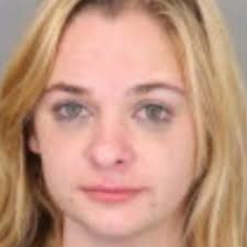 Woman allegedly hit, bit police officer