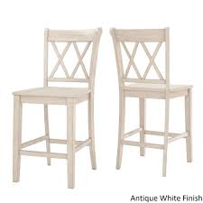Sitting at the perfect height for kitchen counters, breakfast bars, and pub tables, this set of two 33 high bar stools is a stylish addition to any seating ensemble. Elena Antique White Extendable Counter Height Dining Set Double X Back By Inspire Q Classic