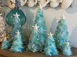 I love having unique and one of a kind christmas decorations! These Sea Glass Christmas Trees Will Transform Your Home Into A Coastal Paradise For The Holidays