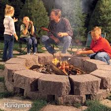 Learn how to build a firepit in your backyard. How To Build A Stone Fire Pit Ring Diy Family Handyman
