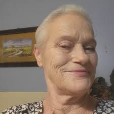 Can you edit my son's photo to look happier?