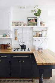 The open shelves with dishware are another notable feature worth mentioning. 25 Butcher Block Countertops For Your Kitchen Shelterness