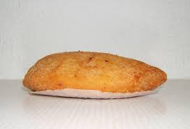 While potatoes are cooling, chop the onion finely and also chop tin of corned beef into chunks. Rissole Wikipedia
