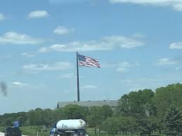 At 180 feet in height, the top of the metal flagpole towers 90 feet above an overpass junction of state route 16. Largest Free Flying American Flag Glock Forum Glocktalk
