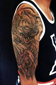 12 Japanese Lion Tattoo Designs And Ideas Petpress Foo Dog Tattoo Japanese Foo Dog Foo Dog Tattoo Design