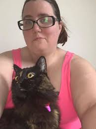 Jilli has developed a habit of licking her front paws. She is 4 and I am  transitioning her from overweight prescription food to Iam's with chicken.  She loves chicken so I don't