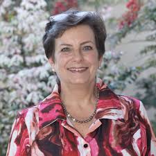 Who is the cyclist who helped a man