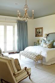 Indian fabrics were used to cover the custom headboard and canopy. New York Cream And Blue Curtains Traditional Bedroom With Bedroom Curtain Ideas French Doors