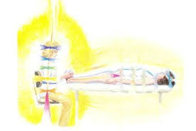 Aura And Chakras Of Energy Healer While Giving A Healing