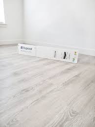 Is luxury vinyl really waterproof? Lifeproof Luxury Rigid Vinyl Plank Flooring White Lane Decor