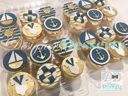 Raise the anchor and set sail for celebration city! Nautical Themed Baby Shower Designer Cupcakes Fondant Cupcake Toppers Navy Blue White And Metallic Navy Baby Showers Nautical Cupcake Nautical Baby Shower