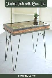 Display Table With Hinged Glass Top Small Add A Bit Of Rustic Flair To Any Room With This Piece Of Furniture Great Place T Glass Table Iron Table Sleek Decor