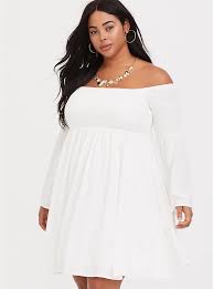 Torrid's plus size wedding guest dresses take the guesswork out of shopping, delivering a whole range of options, sizes and colors so you know you'll find the perfect wedding guest dress to suit the style of the event. Ivory Challis Off Shoulder Skater Dress In 2021 Plus Size Skater Dress White Plus Size Dresses Plus Size Dresses