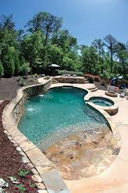 16 X 37 Freeform Concrete Pool With An 8 Round Spa And Many Rock Features Including An Exposed Beam Wall Small Pool Design Backyard Pool Small Inground Pool