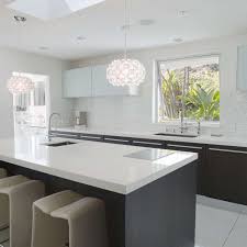 If you love gray kitchens but you also love rich wood tones, try these ideas for two tone wood and gray kitchen cabinetry. 8 Fabulous Two Toned Kitchens