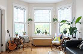 A Chicago Couple S So Us Vintage Modern Mix Bay Window Living Room Apartment Decor Living Room Bay Window