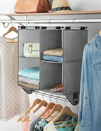 Install strong hooks to your ceiling, and attach rope to dangle below both of them. Closet Organizer Ideas For Maximizing Space Reality Daydream
