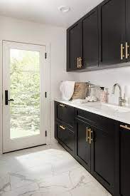 Our kitchen cabinet handles include styles and colours to suit every kitchen design. Black Shaker Laundry Room Cabinets With Brushed Gold Pulls Transitional Kitchen