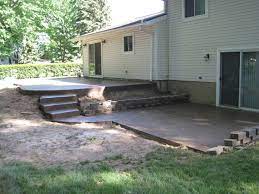 Multi Level Patio With Concrete Steps Concrete Patio Backyard Upgrades Concrete Backyard
