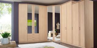 Shown in the sepia grey brown shade colourway. Eckkleiderschrank Luxor 3 4 Wiemann Modern Holz Schwingturen