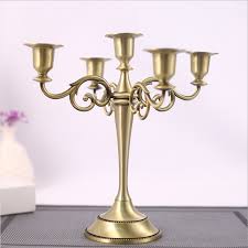 Gold luxury tall gold candle holders clock iron art fashion christmas candelabra ornaments creative goblet designed glass candle holder decorative candle vase tall candleholder home. China Nordic Style Decorating Candle Holders Gold Tall Candle Holders For Weddings Metal Tealight Candle Holders China Home Decor And Candle Holders Price