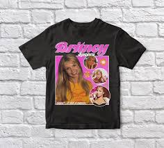 For many of us,* the '90s didn't start until britney spears' debut album .baby one more time hit the shelves at tower records in 1999. Britney Spears 90s Vintage Unisex Schwarz T Shirt Manner T Shirt T Shirts Aliexpress