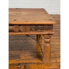 If you want an easy way to pull your living room together, look no further than coffee table sets. Rustic Indian Sheesham Wood Coffee Table With Nailhead Design And Baluster Legs Chairish